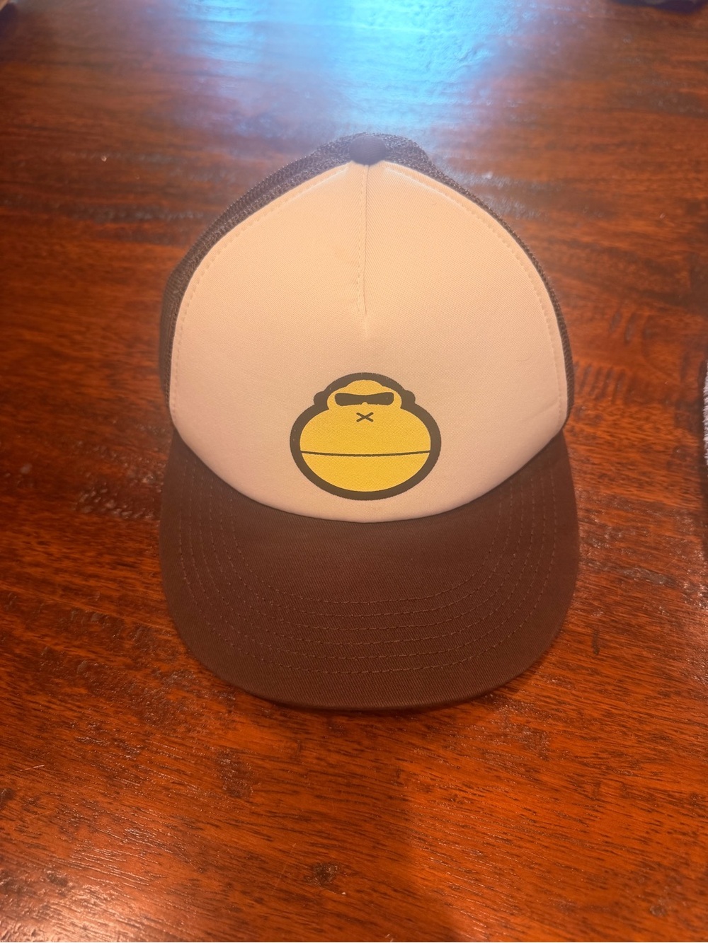 Brown and Cream Trucker Hat with Yellow Monkey Logo